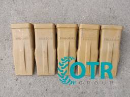 Коронки на экскаватор Caterpillar