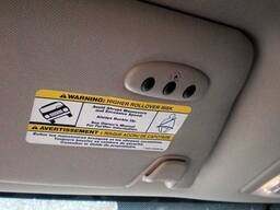 Автокөлік түймесінен қақпаларды басқаруға арналған HomeLink модулі