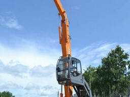 Перегружатель металлолома с подъемной кабиной «UMG - Эксмаш»