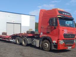 Перевозка экскаватора спецтехники. Аренда низкорамного трала