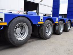 Полуприцеп-тяжеловоз низкорамный 4-х осный