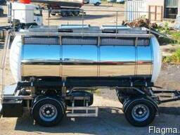 Прицеп-цистерна для перевозки молока.