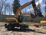 Услуги, аренда, заказ колесного экскаватора - фото 1