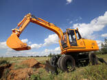 Услуги, аренда, заказ колесного экскаватора - фото 2