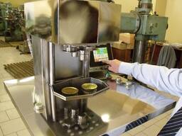 Вакуум-закаточная машина